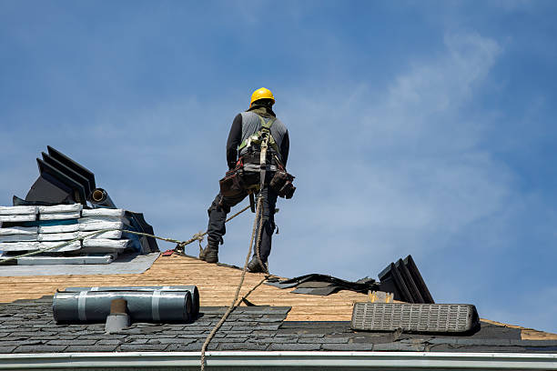 Professional Gutter Installation technician working in Tishomingo, OK